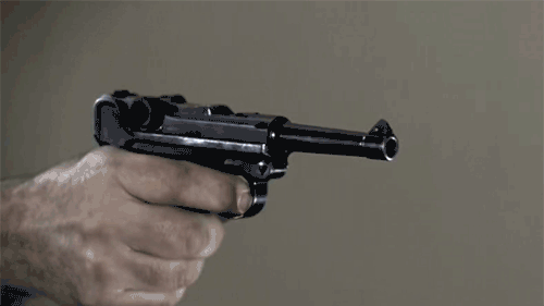 百年经典手枪射击慢镜头.gif